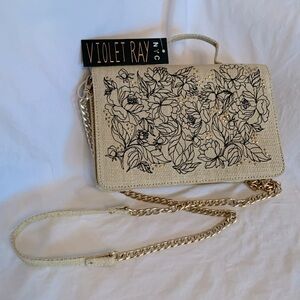 Violet Ray NYC handbag. Can be used as a clutch or purse. Removable strap.